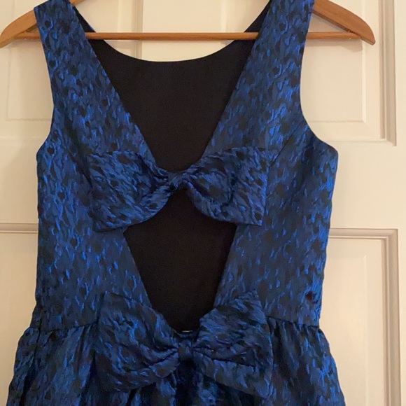 Designer double back bow dress.